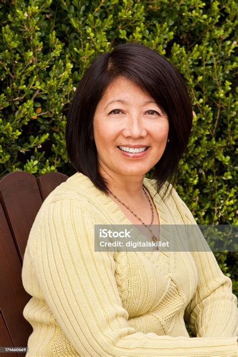 asian mature|Beautiful mature asian woman Stock Photos and Images